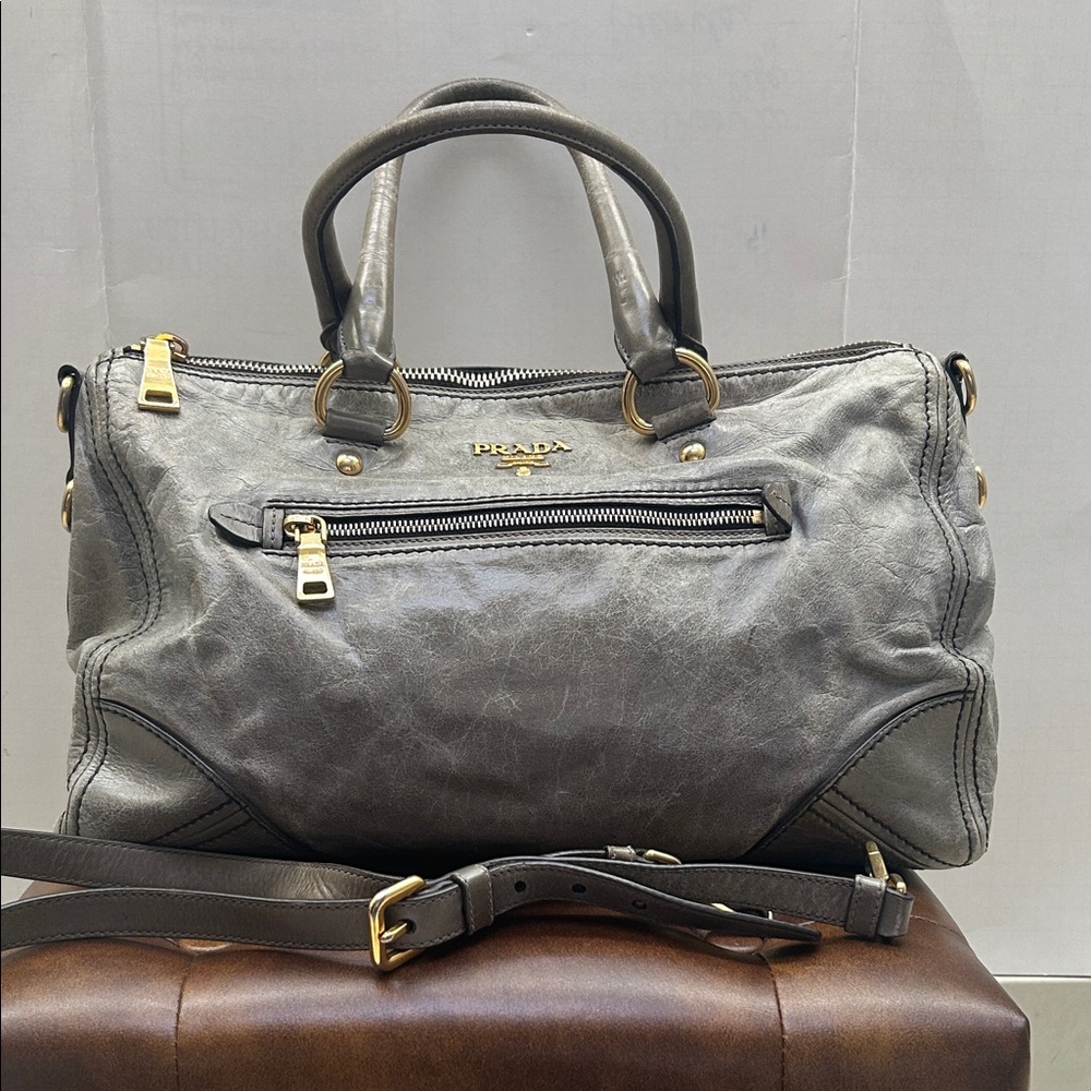 Authentic Prada Vitello Shine grey leather Two-Way bag with gold accents & logo